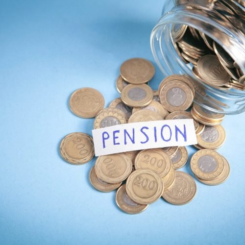 Coins in a glass jar. Pension